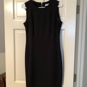 Calvin Klein black bodycon dress. Knee length